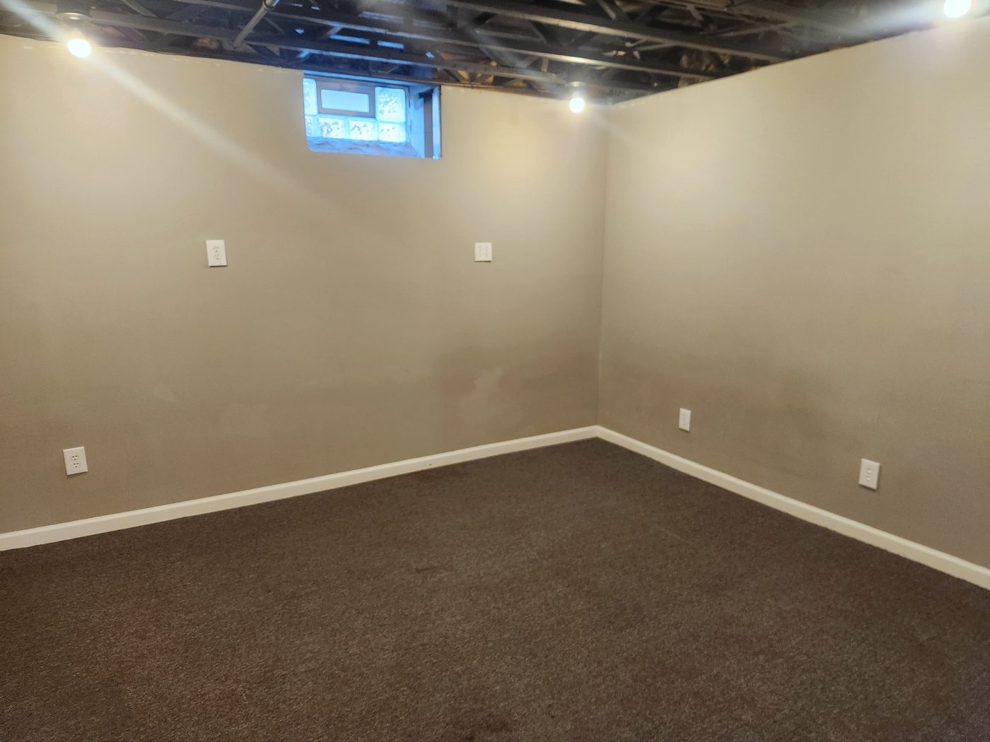 Basement bonus room with glass block window