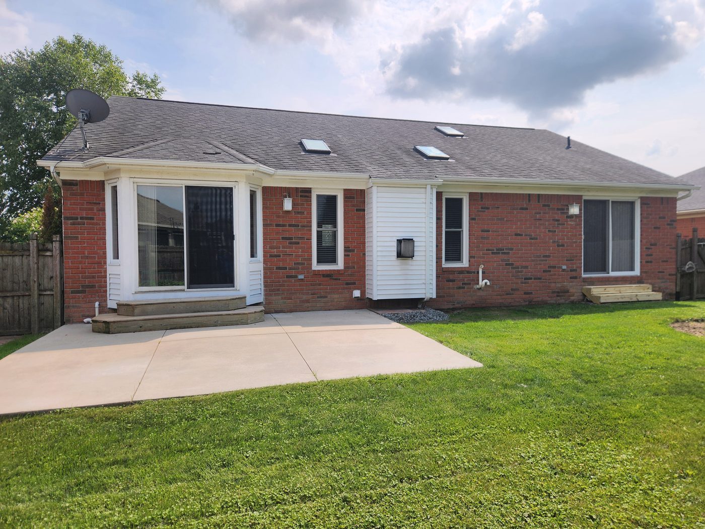 Back elevation with skylights and patio